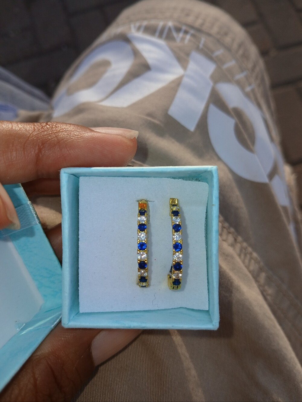 DKNY Gold Plated Huggie Earrings with Blue Stones